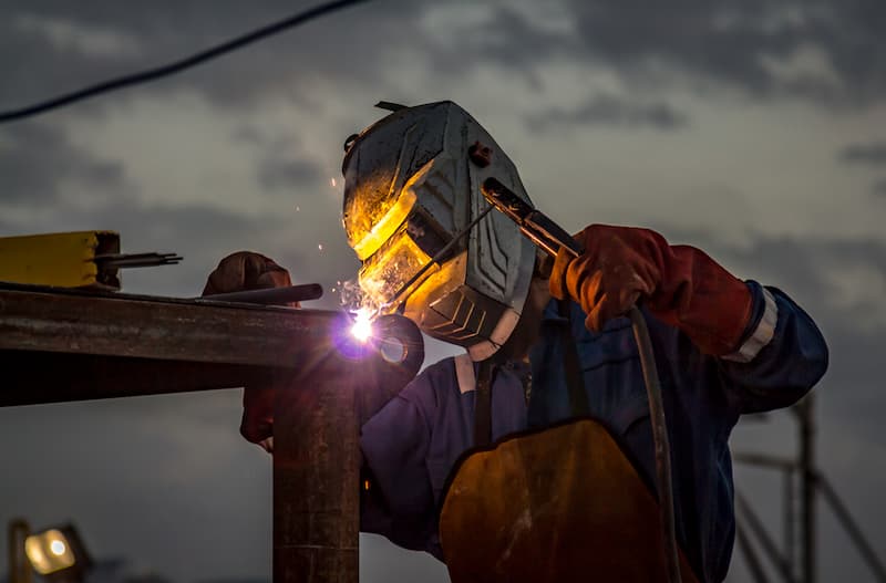 person welding