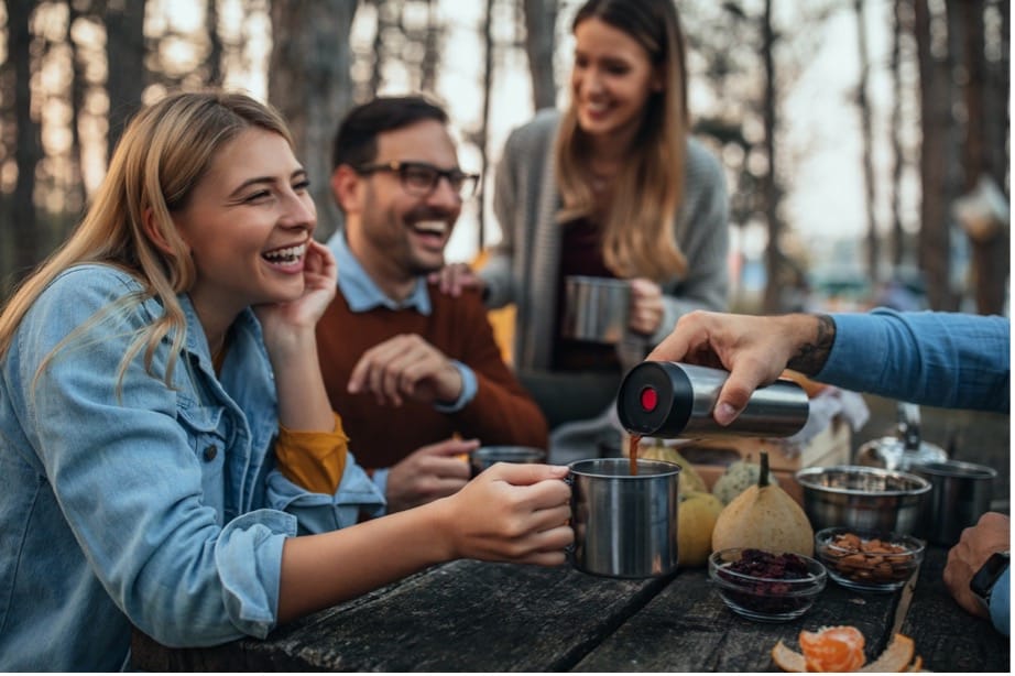 A group of people sitting at a table