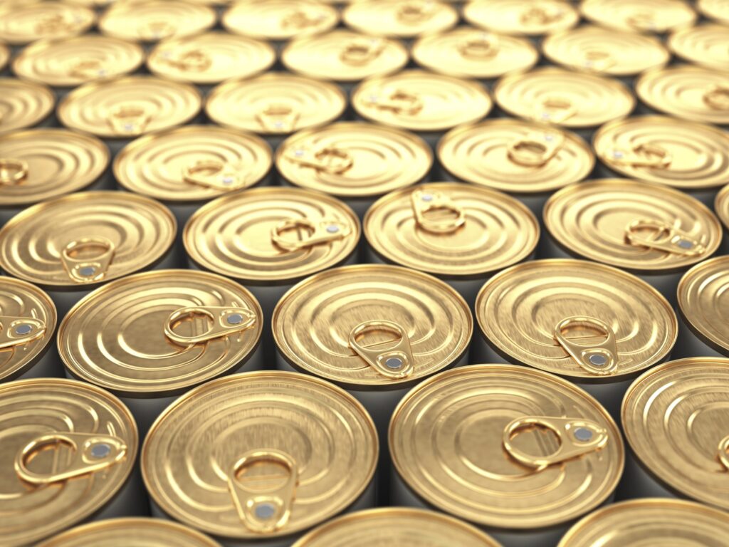 Food tin cans. Groceries background.